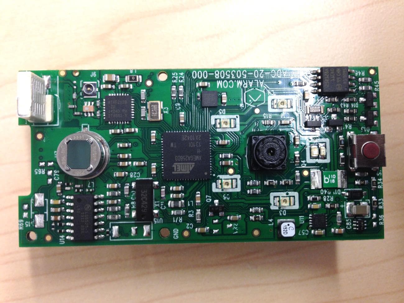 A motion sensor which also takes images of the motion - FCC ID YL6-143IS22 - Alarm.com Incorporated