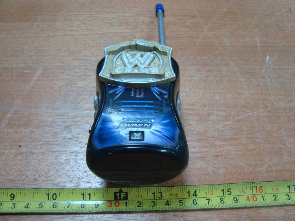 WWE Walkie Talkie - FCC ID YNIJAZWARES13510 - Jazwares, LLC (4)