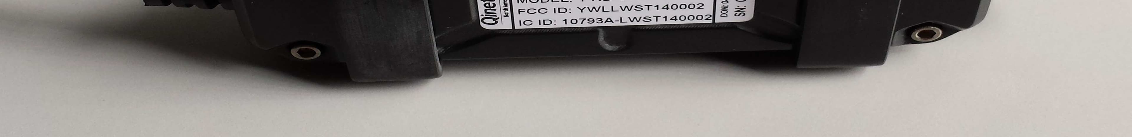 The RF Dongle, 2.4 GHz radio connected to a mobile tablet, is part of the qinetiq North AMerica LinWatch product line. The RF Dongle is used in conjunction with the setup tool for calibating LineWatch MVSS sensors. - FCC ID YWLLWST140002 - QinetiQ North America, Inc. (2)