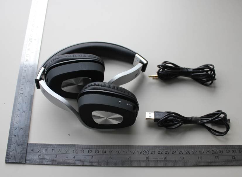 Bluetooth Headset - FCC ID Z63-897866863 - SHENZHEN AONI ELECTRONIC CO., LTD. (2)