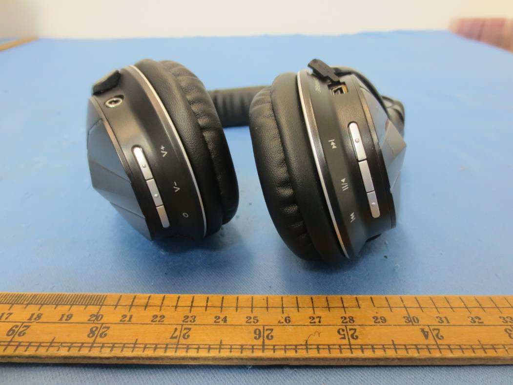 Bluetooth headset - FCC ID Z63-AONI80601 - SHENZHEN AONI ELECTRONIC CO., LTD. (2)