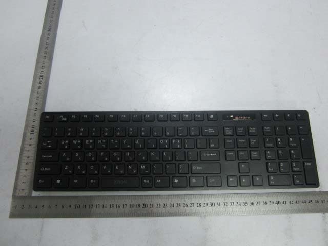 Wireless Keyboard Transmitter - FCC ID Z8C-SRK2000 - Xzion Wireless Co., Ltd.