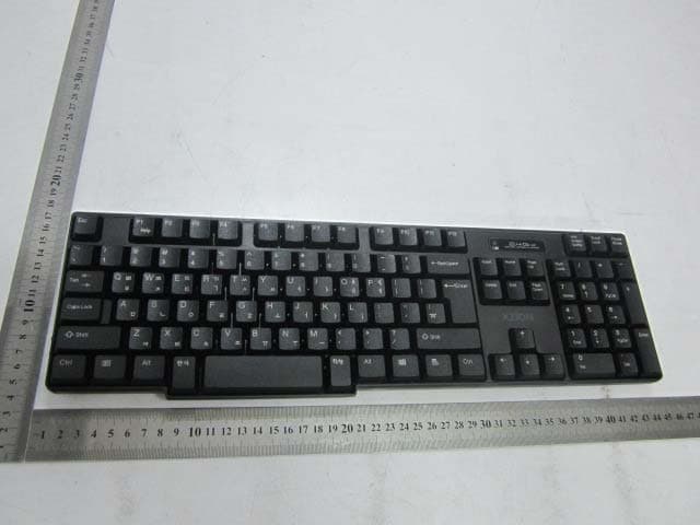 Wireless Keyboard Transmitter - FCC ID Z8C-SRK810 - Xzion Wireless Co., Ltd.