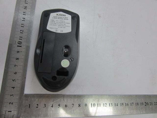 Wireless Mouse Transmitter - FCC ID Z8C-SRM810 - Xzion Wireless Co., Ltd. (2)