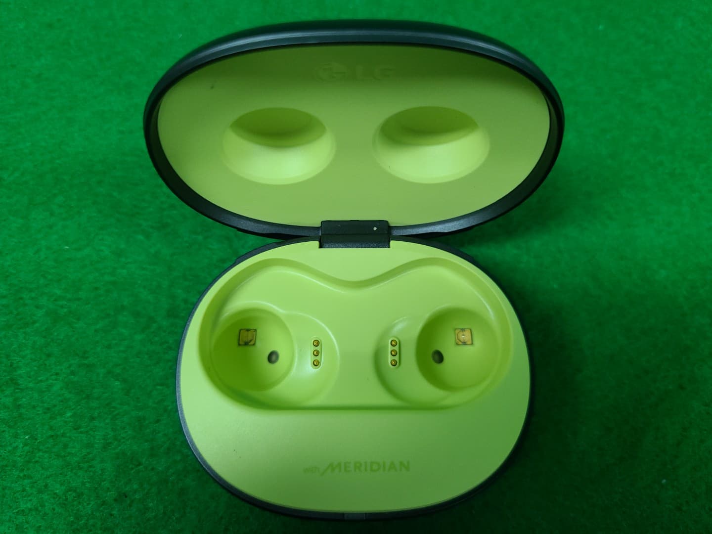 Bluetooth Earbud (Cradle) - FCC ID ZNFTONETF8QC - LG Electronics USA, Inc. (2)