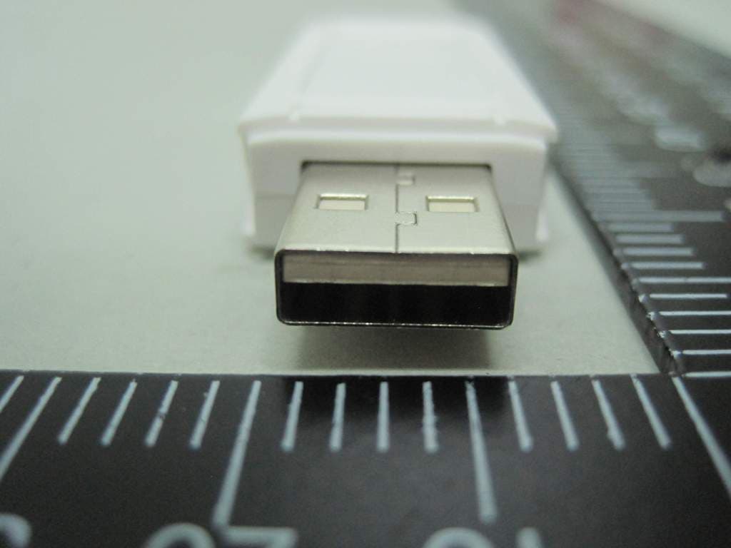 Wi-Fi USB Dongle - FCC ID ZQ6-99PW020046R - AMPAK Technology Inc. (3)