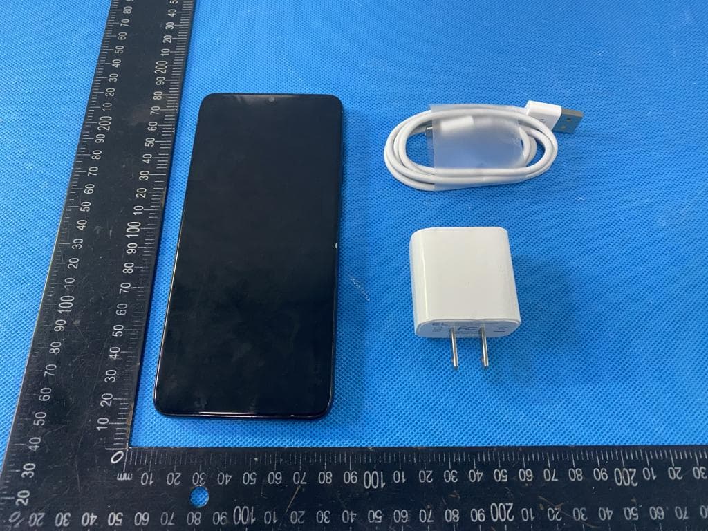 Mobile Phone - FCC ID ZSHX80 - SHENZHEN KENXINDA TECHNOLOGY CO.,LTD