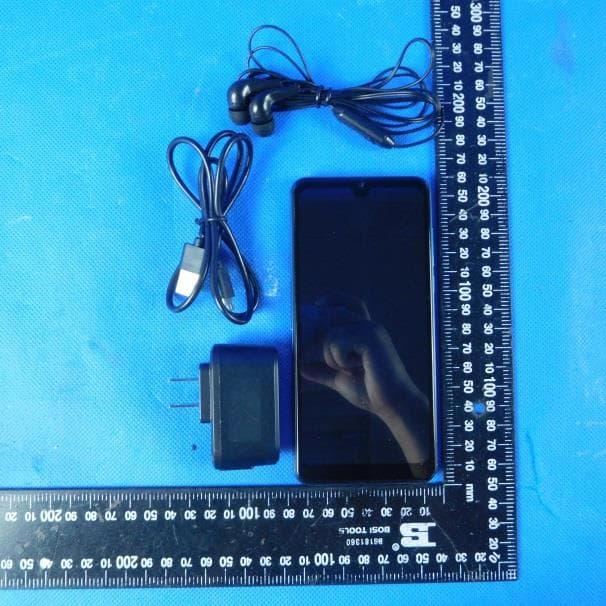 Mobile Phone - FCC ID ZSW-30-100 - b mobile HK Limited