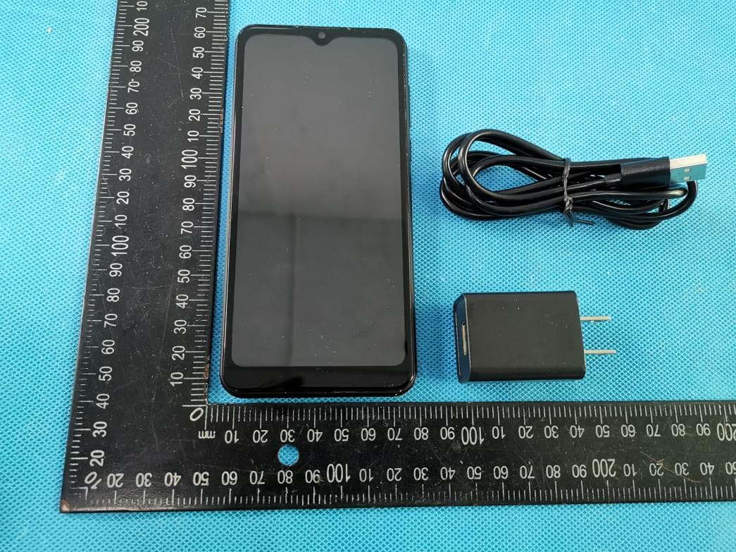 Mobile Phone - FCC ID ZSW-30-107 - b mobile HK Limited