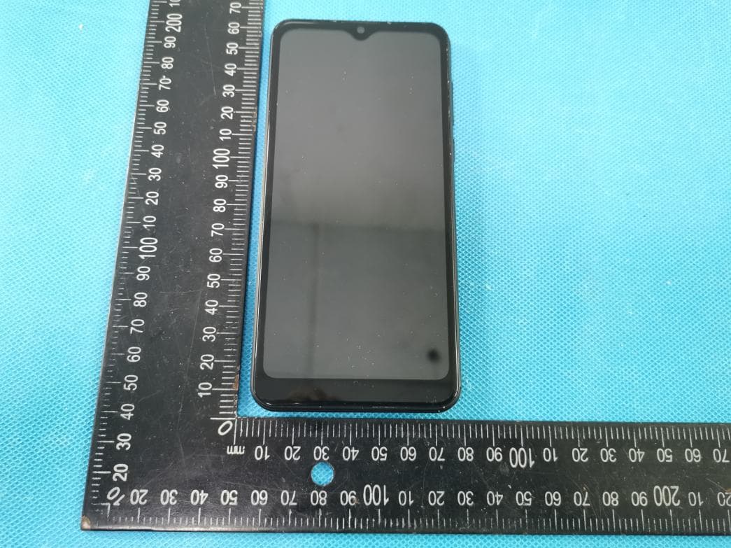 Mobile Phone - FCC ID ZSW-30-107 - b mobile HK Limited (2)