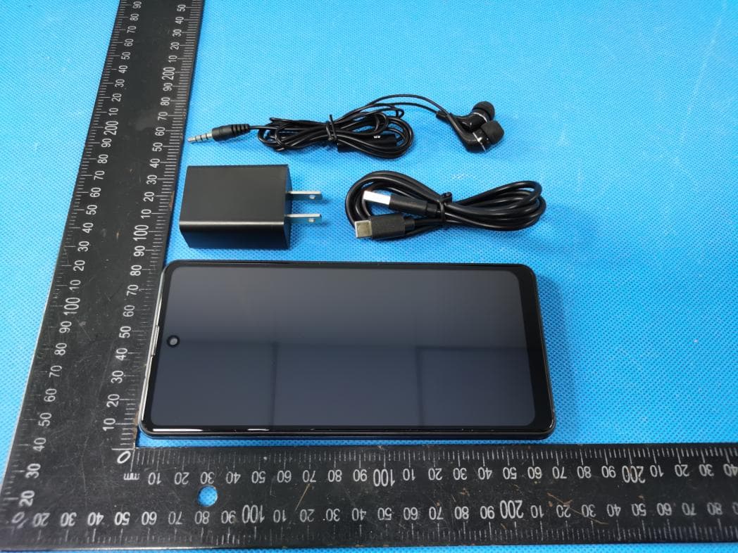 Mobile Phone - FCC ID ZSW-30-118 - b mobile HK Limited (2)