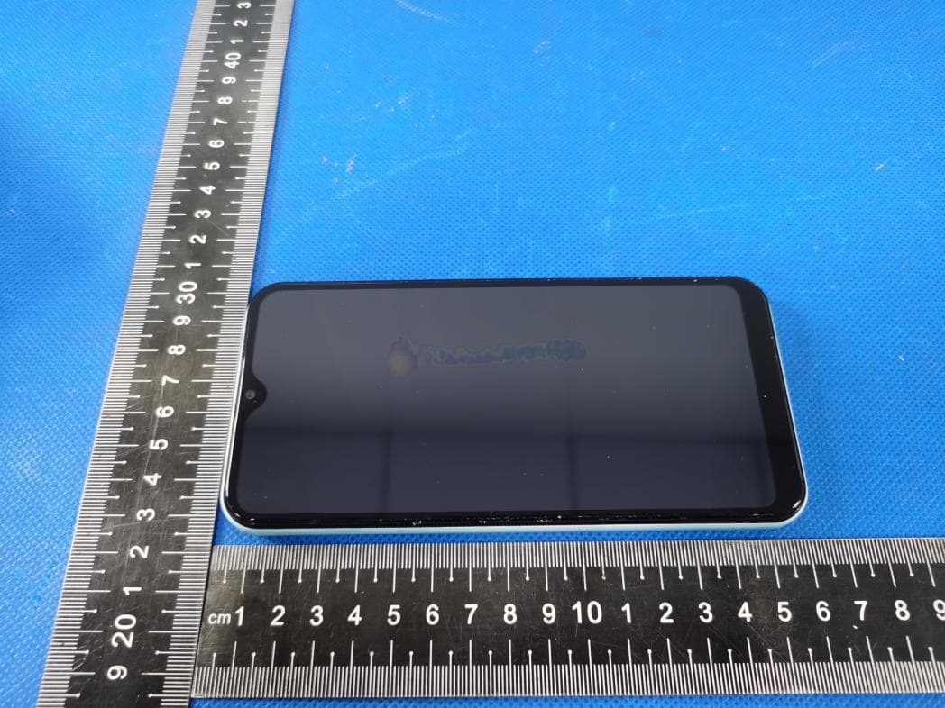 Mobile Phone - FCC ID ZSW-30-125 - b mobile HK Limited (3)