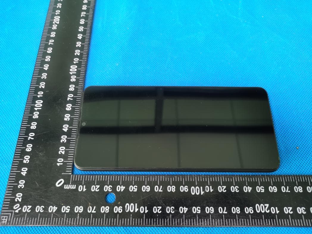 Mobile Phone - FCC ID ZSW-30-135 - b mobile HK Limited (2)