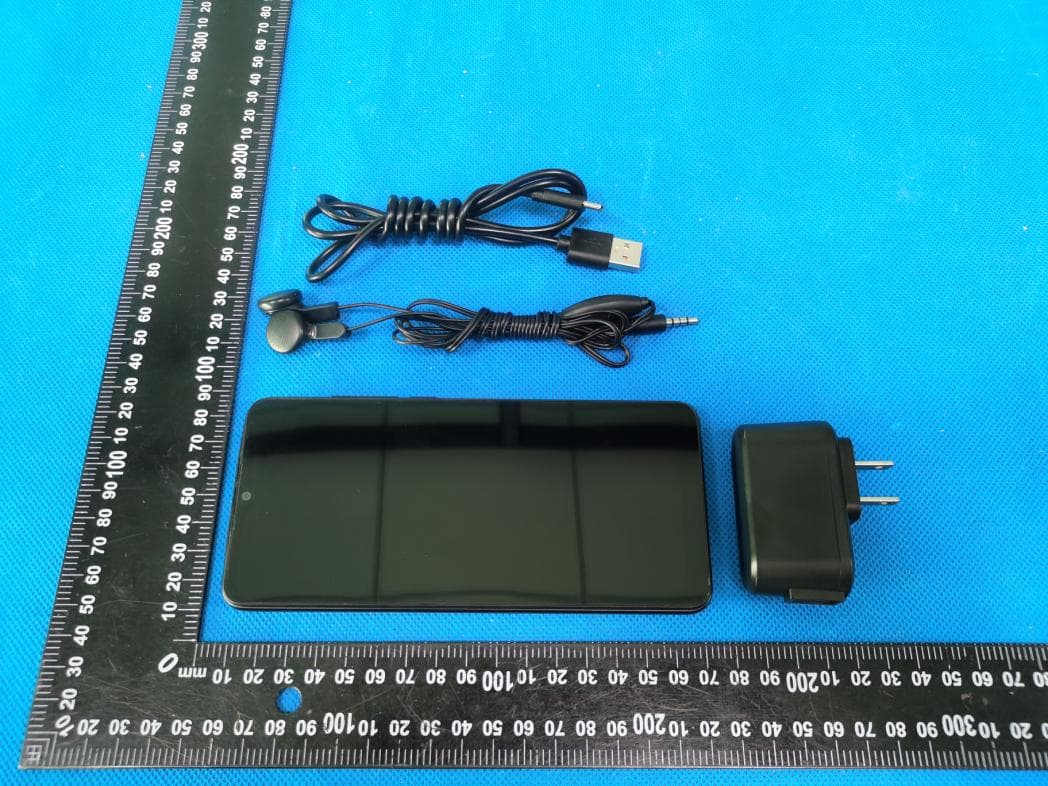 Mobile Phone - FCC ID ZSW-30-135 - b mobile HK Limited