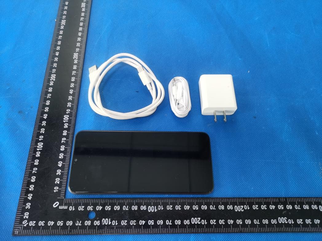 Mobile Phone - FCC ID ZSW-30-143 - b mobile HK Limited
