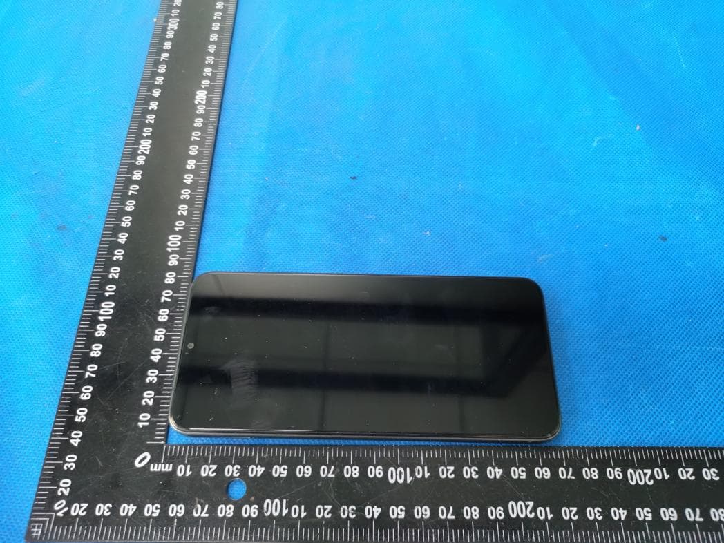 Mobile Phone - FCC ID ZSW-30-143 - b mobile HK Limited (3)