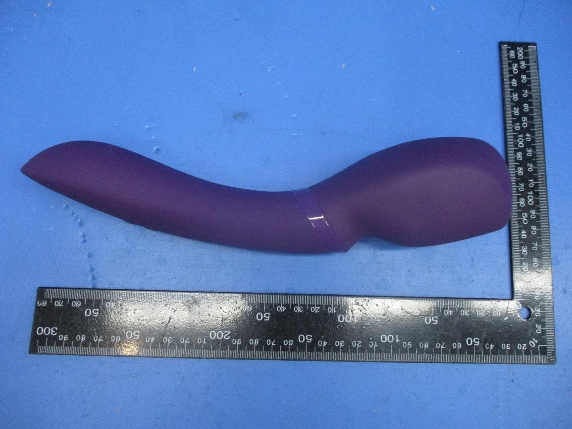 Vibrating massager - FCC ID ZUEWND20B - WOW Tech Canada Ltd.
