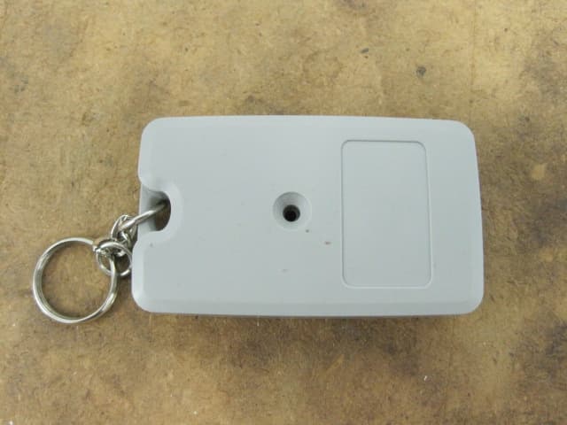 Garage door transmitter - FCC ID ZWKEZCODEM300 - Export Management System Inc (2)