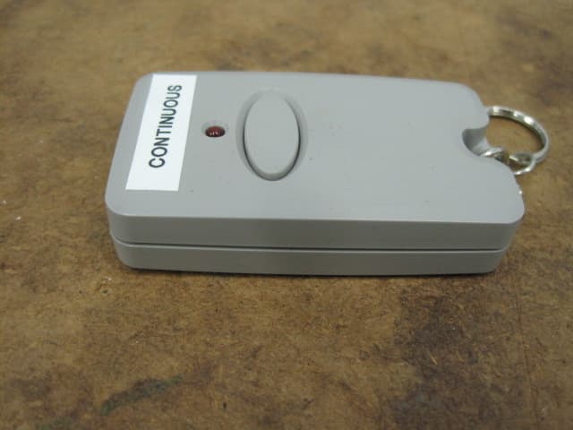 Garage door transmitter - FCC ID ZWKEZCODEM300 - Export Management System Inc (4)