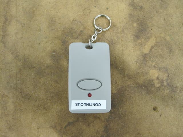 Garage door transmitter - FCC ID ZWKEZCODEM300 - Export Management System Inc (1)