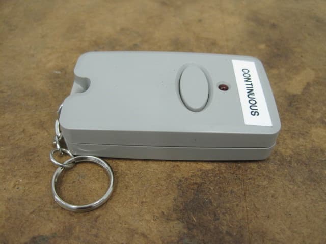 Garage door transmitter - FCC ID ZWKEZCODEM300 - Export Management System Inc (3)