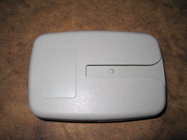 Garage door transmitter - FCC ID ZWKEZCODER300 - Export Management System Inc