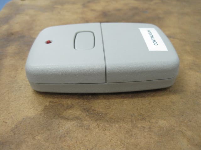 Garage door transmitter - FCC ID ZWKEZCODER300 - Export Management System Inc (4)