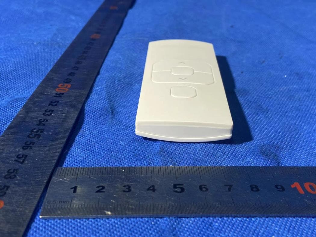 hand-held remote with 5 channels for operating and programming blinds - FCC ID ZY4CM48 - Coulisse B.V. (2)