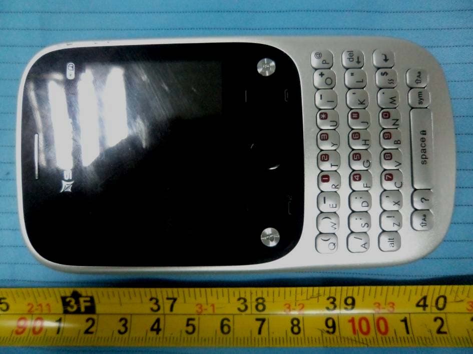 GSM Mobile Phone - FCC ID ZYPE561 - Nexpro International Limitada