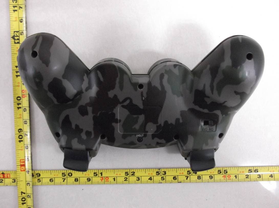 PS3 Basic Bluetooth Controller - FCC ID ZZISL-2104 - Solar Loyal Limited (4)