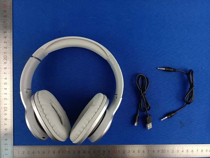 Headphones - FCC ID 2A3ZO-22052 - Hong Kong Etech Groups Ltd.