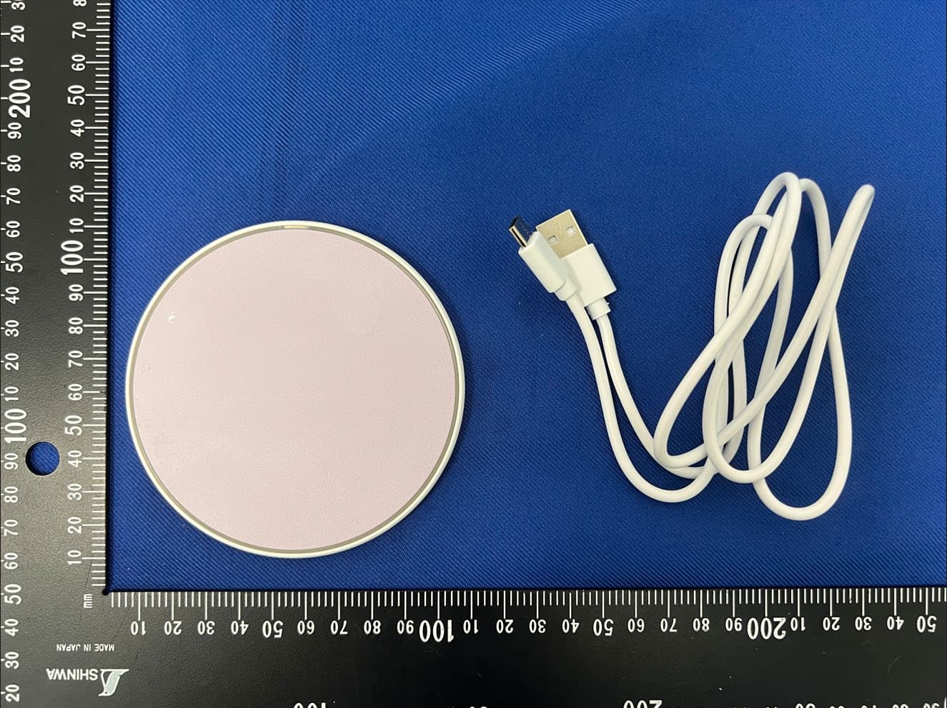 Wireless charger - FCC ID 2A3ZO-ETS-W-085 - Hong Kong Etech Groups Ltd.