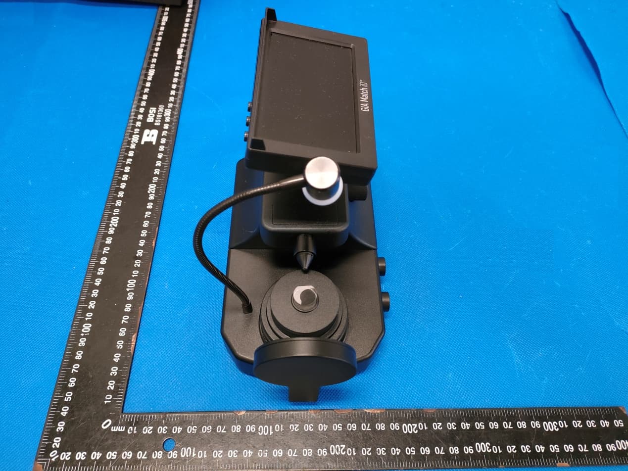 GIA Match iD - inscription viewer - FCC ID 2A8HF-230000 - Sunlin Jewellery Equipment Group (HK) Co., Ltd.