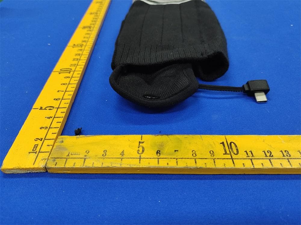 Heated Socks - FCC ID 2A8YOQT-01 - Dikaku Industrial Co.,Limited