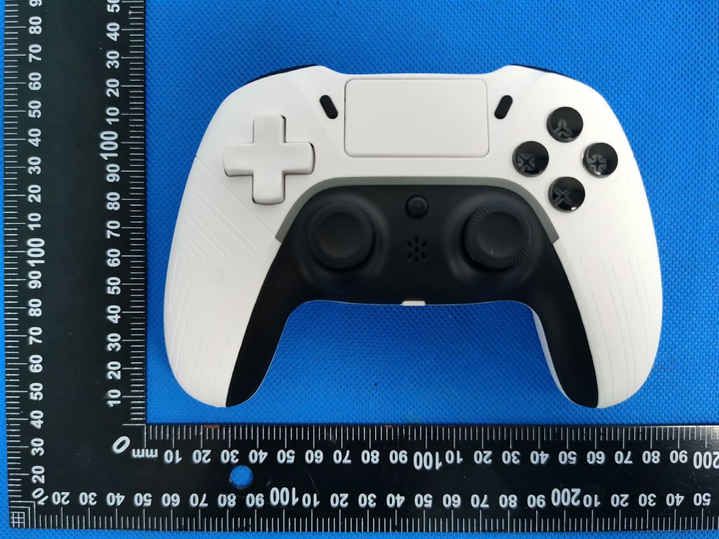 Wireless Gamepad for PS4 - FCC ID 2AEBY-FG02B - ShenZhen Targetever Technology Co.,Ltd.
