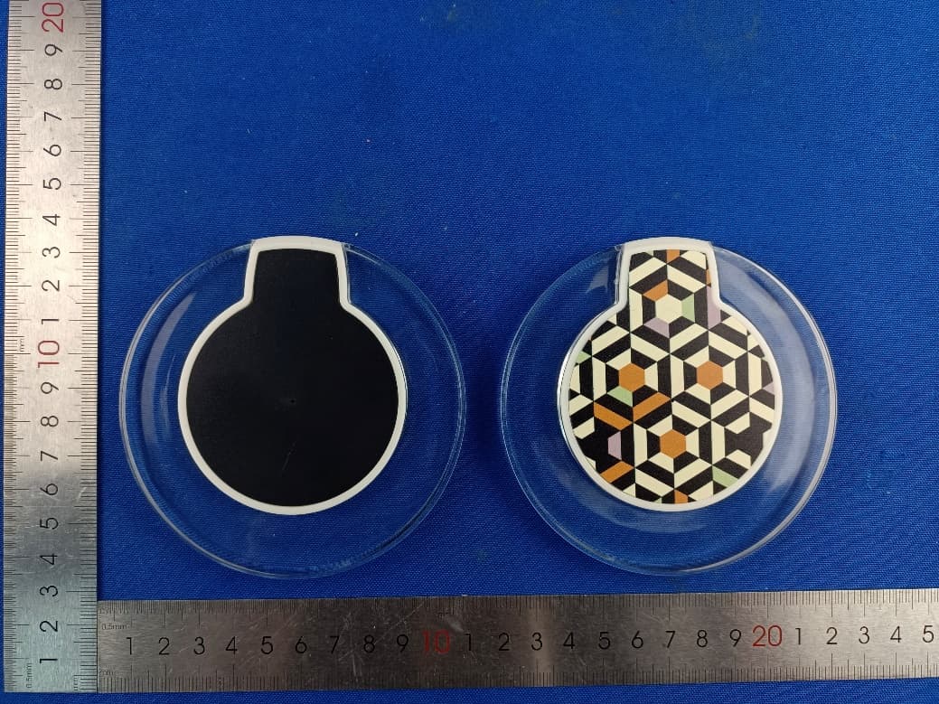 Wireless chrg puck 10W - FCC ID 2AHN6-OPCP100 - Bytech NY Inc.