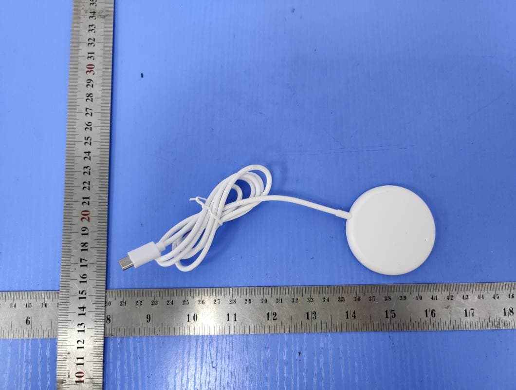 Wireless charger - FCC ID 2ALCFOT013-1 - Dongguan Xing Yue Electronic co., Ltd