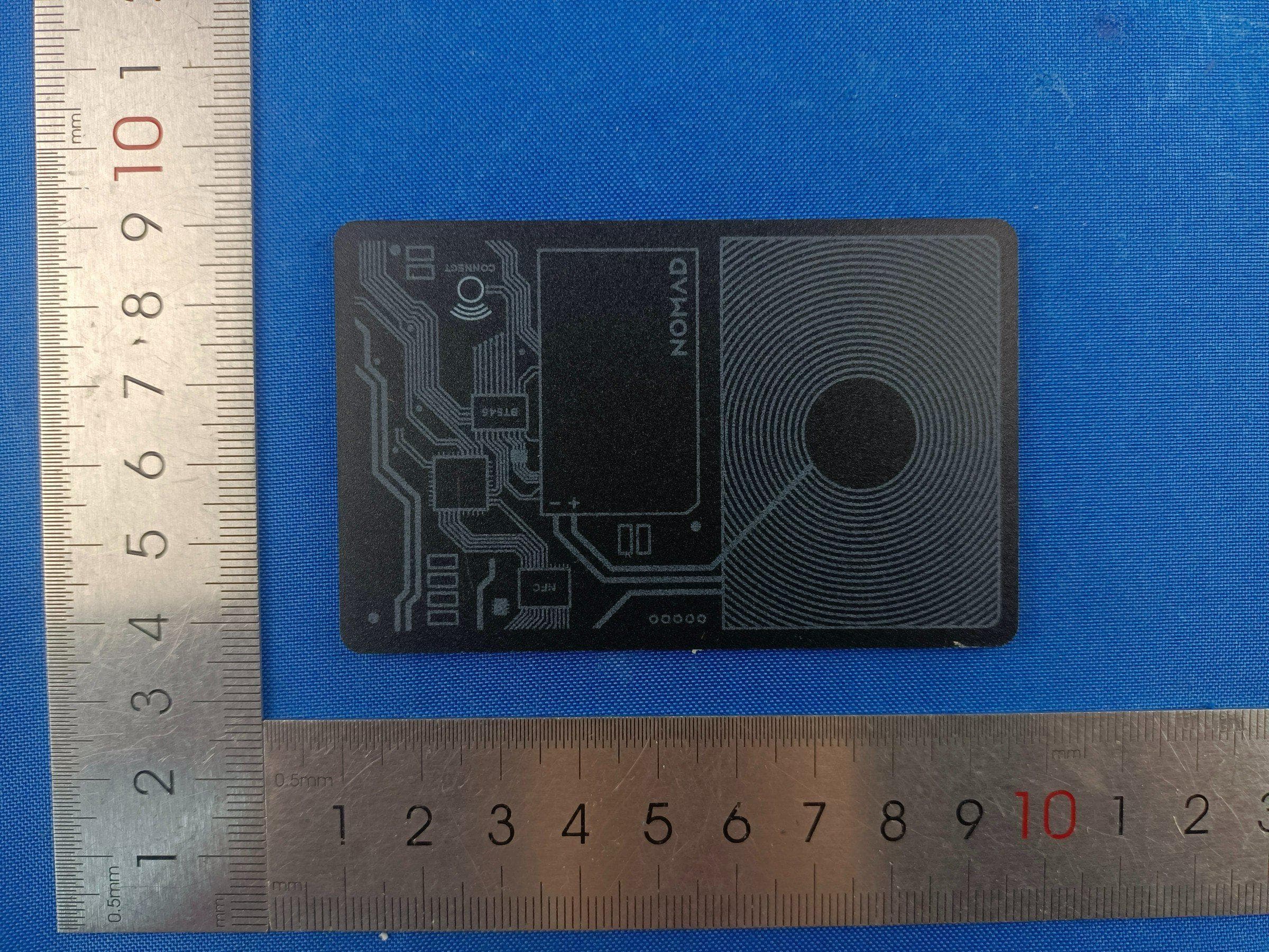 Tracking Card Air - Find My - FCC ID 2AOA2-NM009551858 - Nomad Goods, Inc.