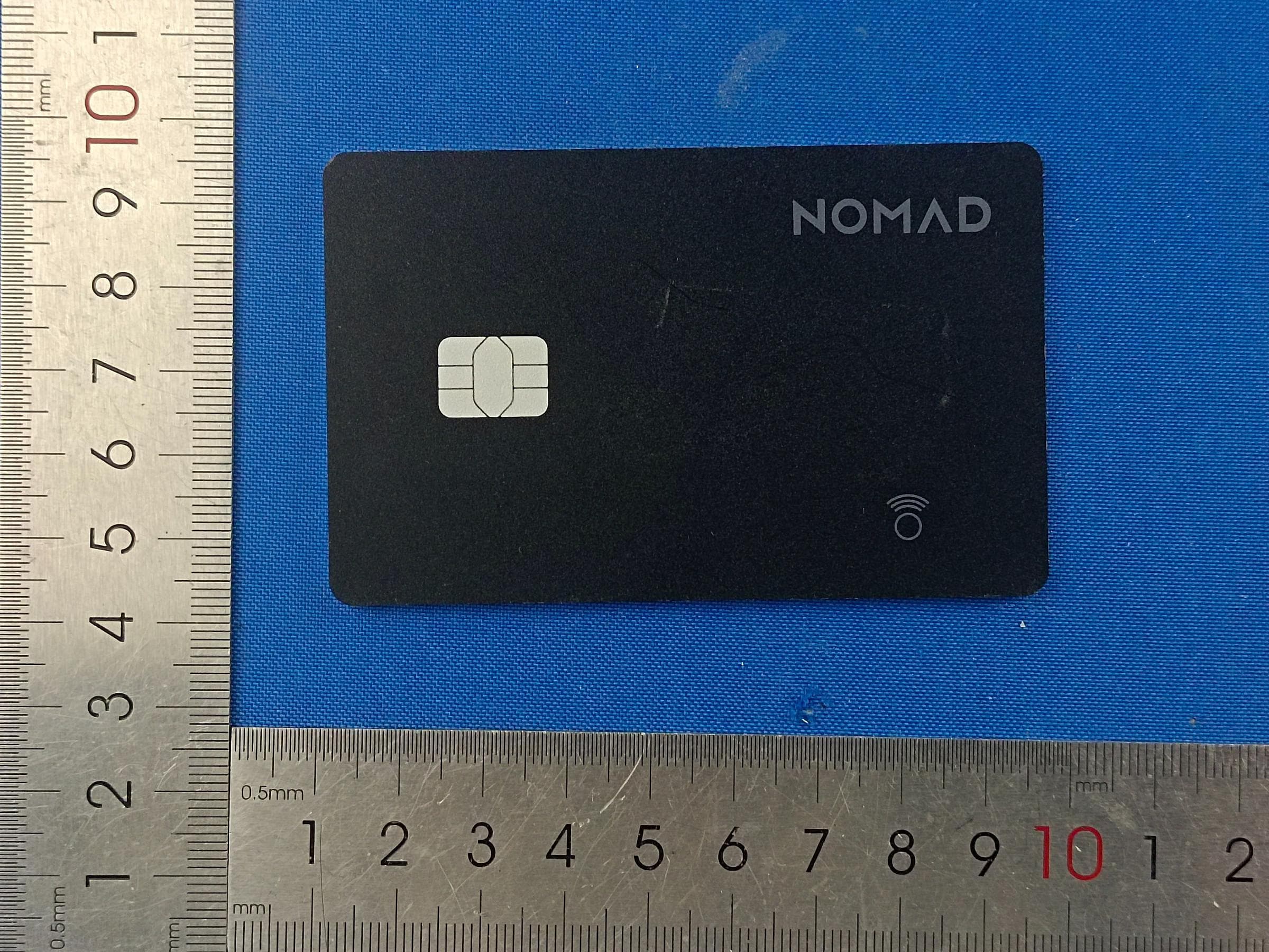 Tracking Card Pro - FCC ID 2AOA2-NM011109858 - Nomad Goods, Inc.