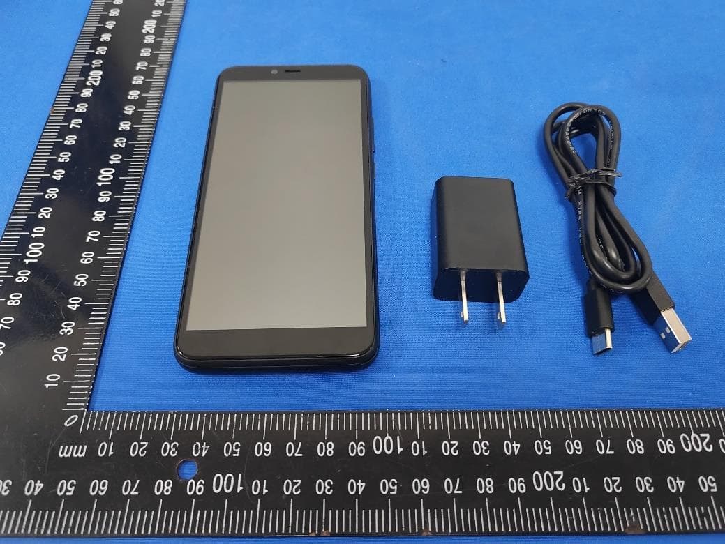 Smart phone - FCC ID 2AQRMA56 - FOXX Development Inc.