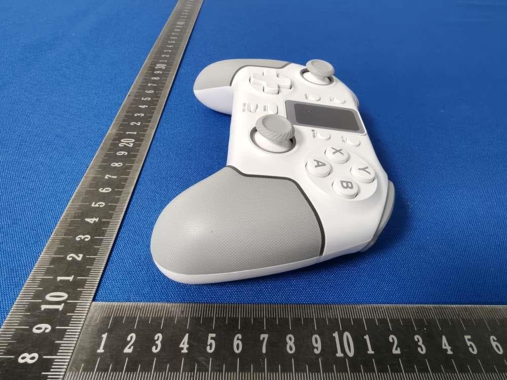 Multi-Function Game Controller - FCC ID 2ATI7STK-7052PD - SHENZHEN SAITAKE ELECTRONIC CO.,LTD.