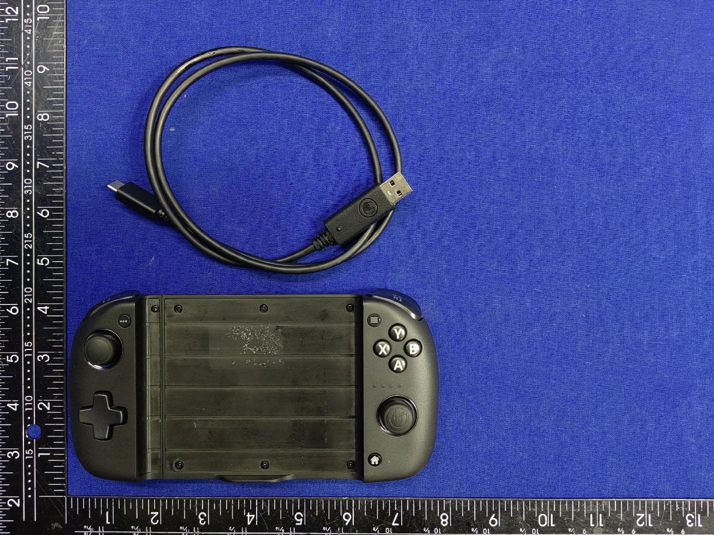 MG-X MFi gaming holder - FCC ID 2AVPR-1230 - Nacon (HK) Limited