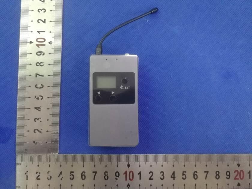 Wireless microphone - FCC ID 2AVXN-KW-M01 - Shenzhen Travor Technology Co, Ltd.
