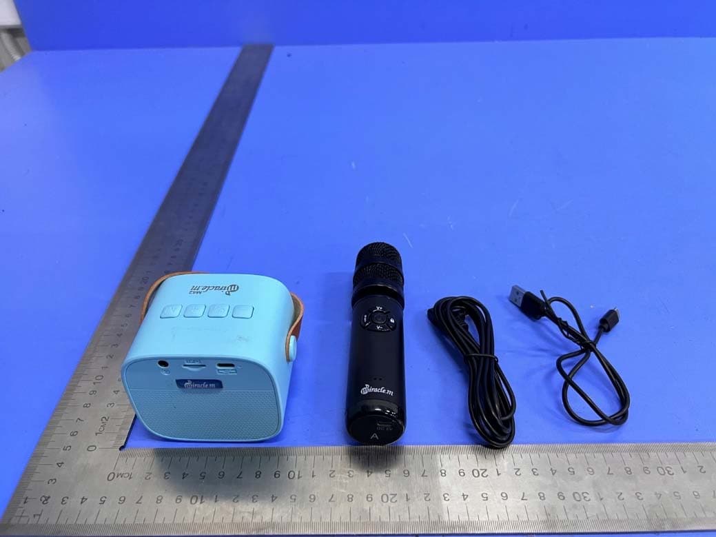 UHF Microphone - FCC ID 2AXWO-M910 - Doors Korea Co., Ltd