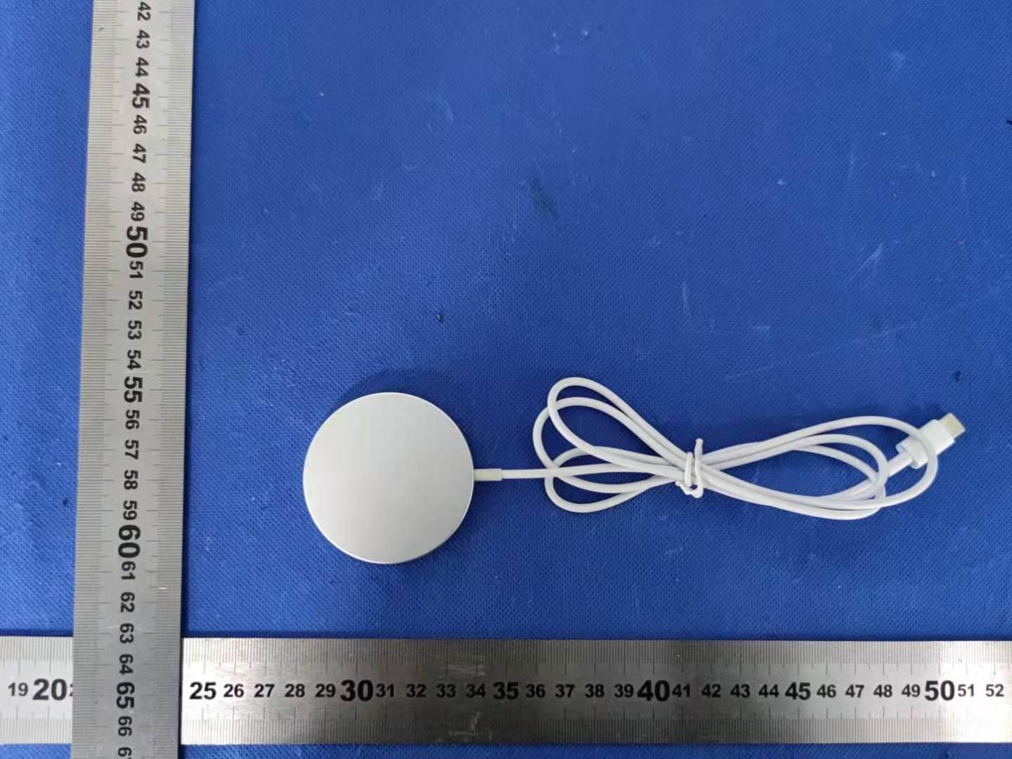 Magnetic Charger - FCC ID 2AYLG-WXC500 - Roumi Technology (Shenzhen)Co.,Ltd