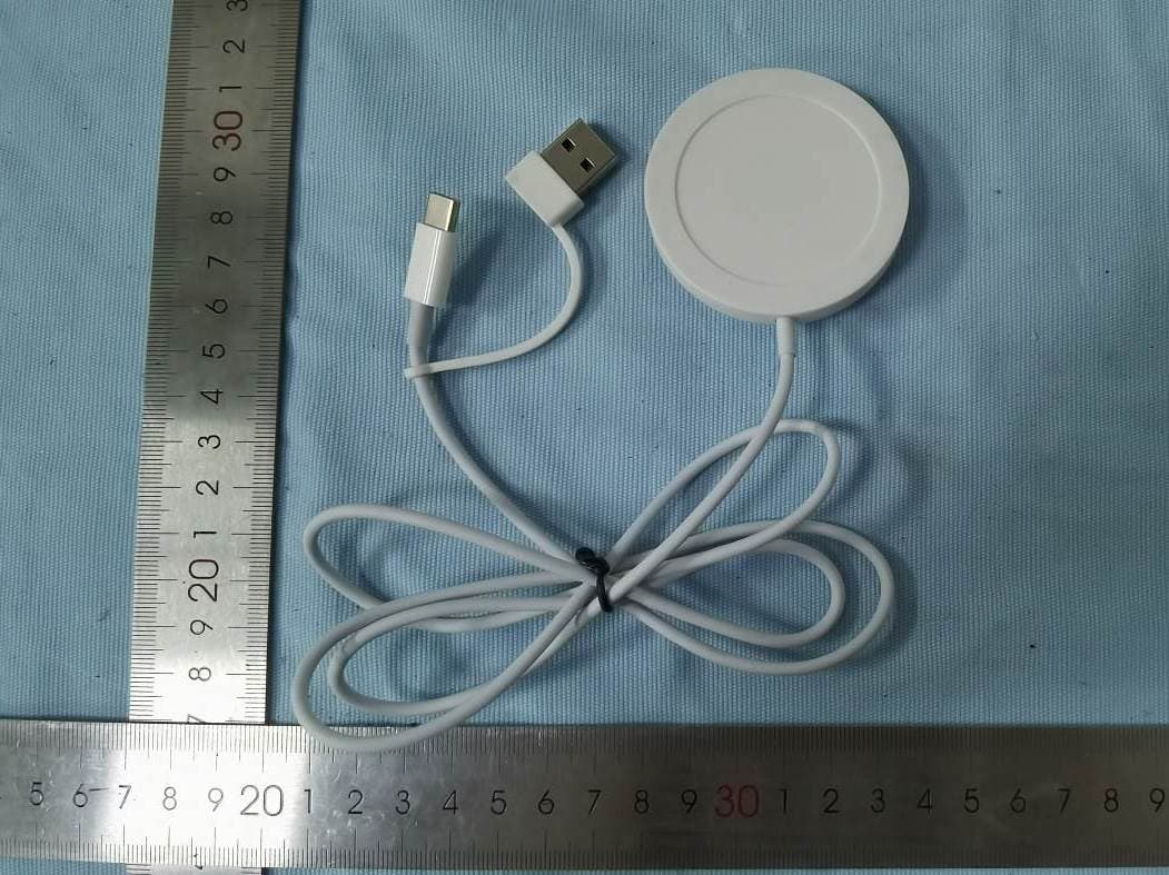 Magnetic Wireless Charger - FCC ID 2AZ8J-ZRP04 - Dongguan Rui Zhan Plastic Technology Co., Ltd.