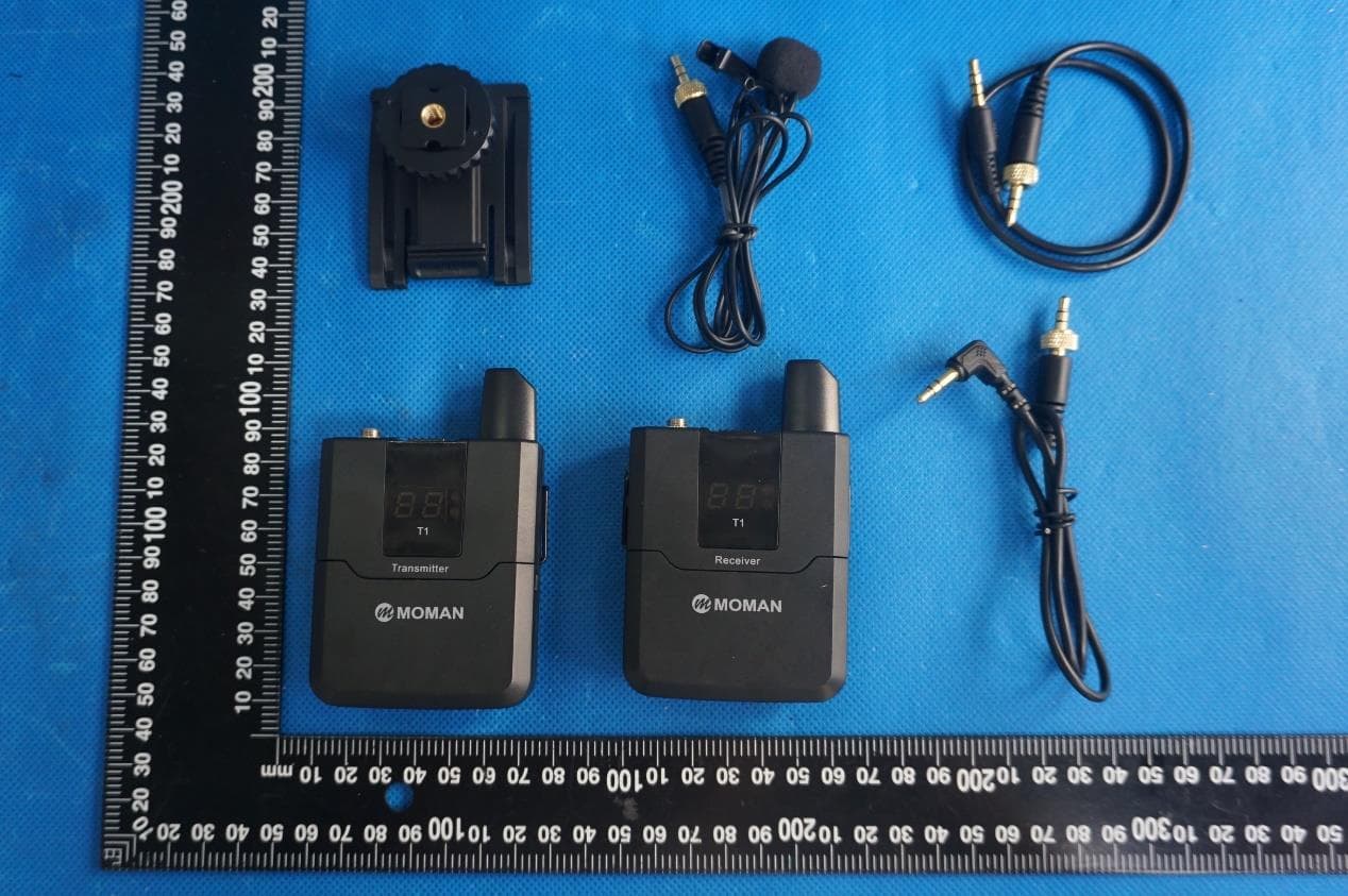 UHF Wireless Microphone - FCC ID 2AZKG-MTS - Moman Technology Limited