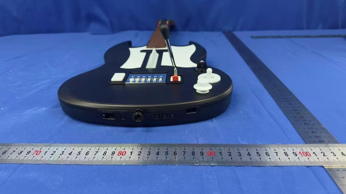 Guitar controller - FCC ID 2BAXLCK25GP - Freemode Go LLC dba CRKD