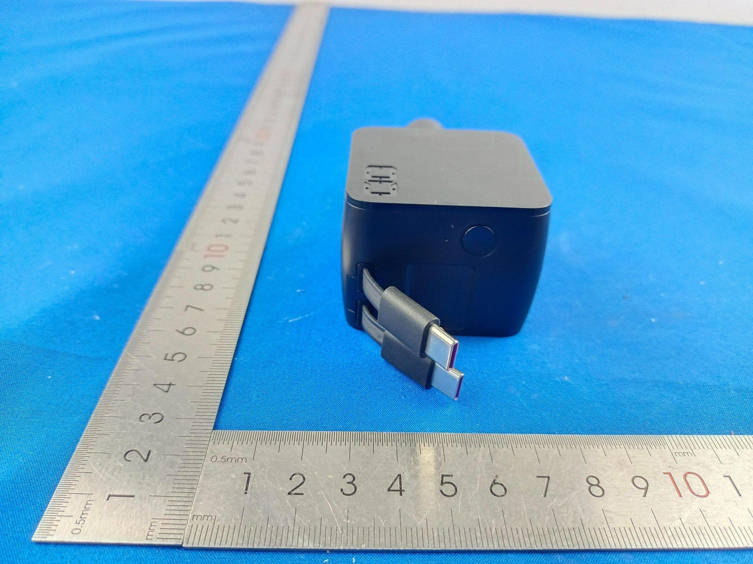 NovaPort Duo 65W2C Built in CORD REEL for CAR - FCC ID 2BTD7-CAR-G65W2C - CIO Co.,Ltd.