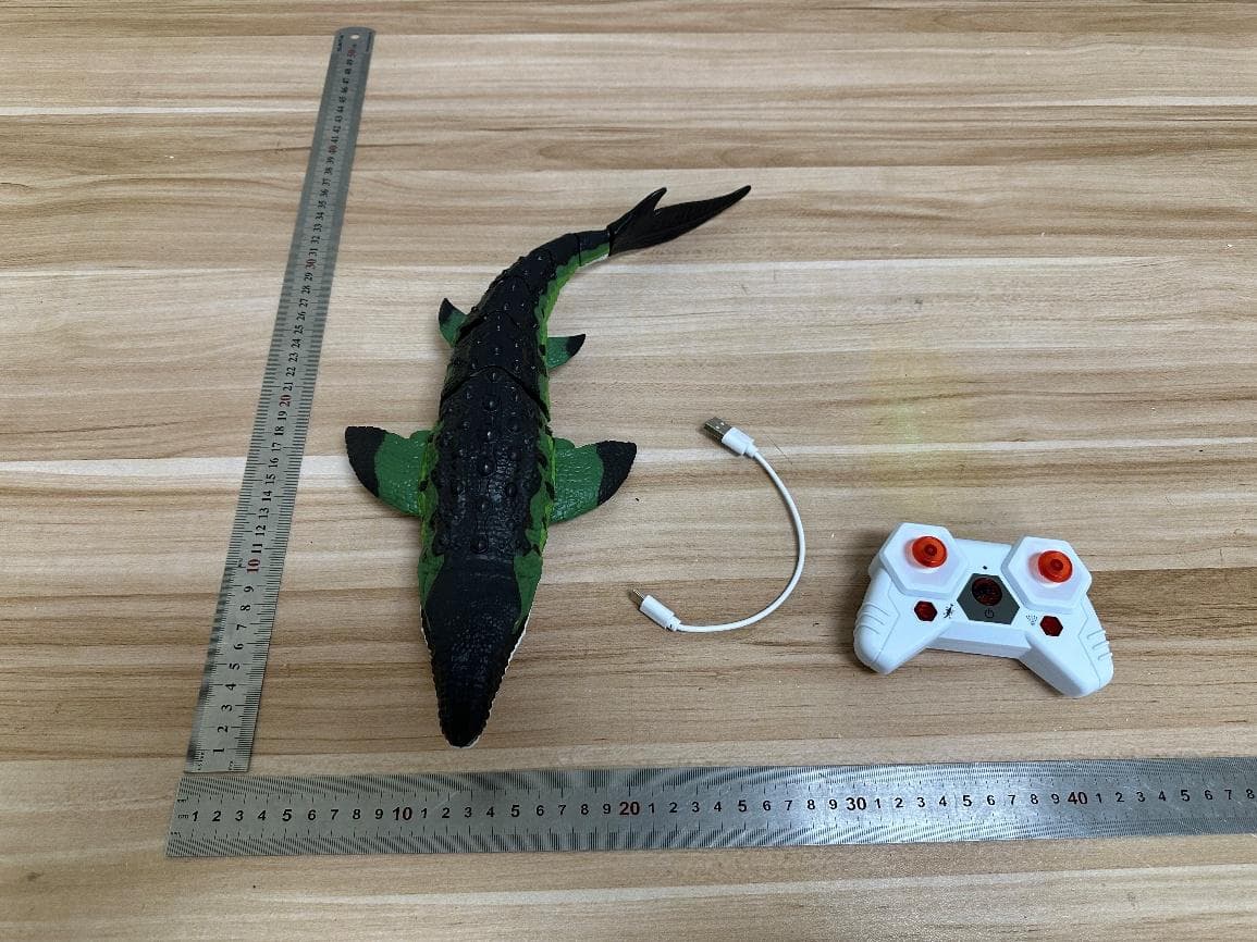 JURASSIC RC MOSASAURUS SWIMMING MOSA - FCC ID 2BVK3T03300 - ToyMonster International Limited